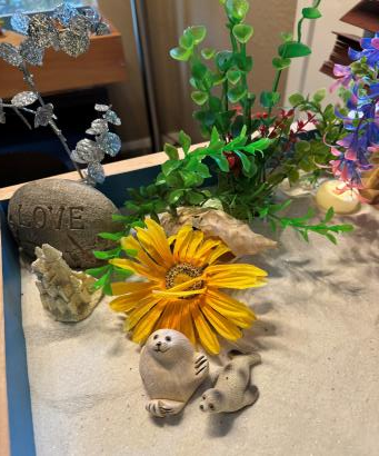 sandtray walrus and flower
